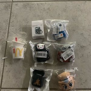 Airbuds cases new in original cases 
7 Pc